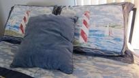 Comfortable bedroom with warm quilts at Sea Escape